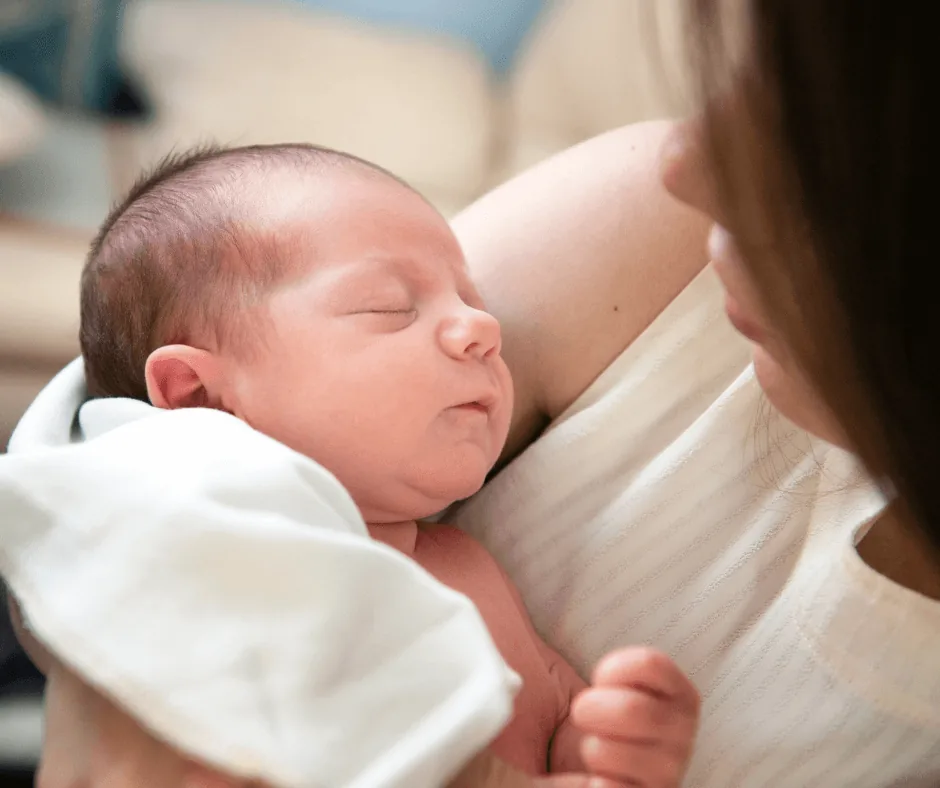 First-time mum breastfeeding her newborn