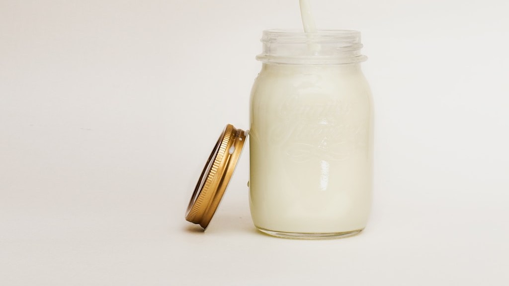 Jar of milk representing breastmilk's liquid-gold benefits